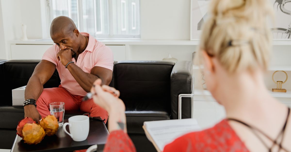 Therapist discussing with a client in a mental health counseling session.