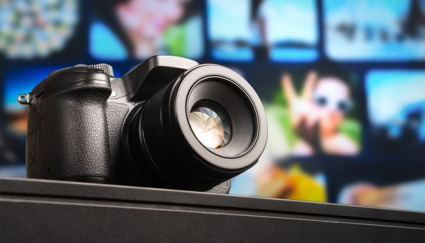 Close-up view of a DSLR camera lens with visible aperture and blurred background.