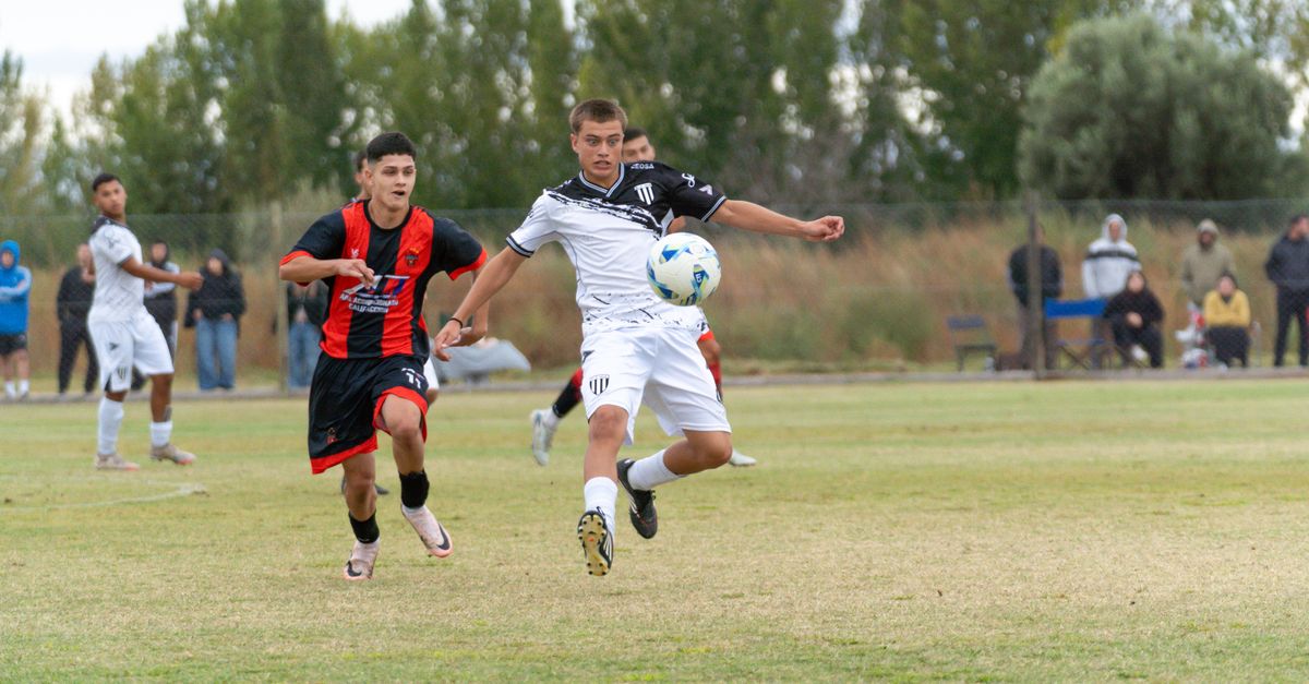 Energetic outdoor soccer match featuring young athletes competing passionately.